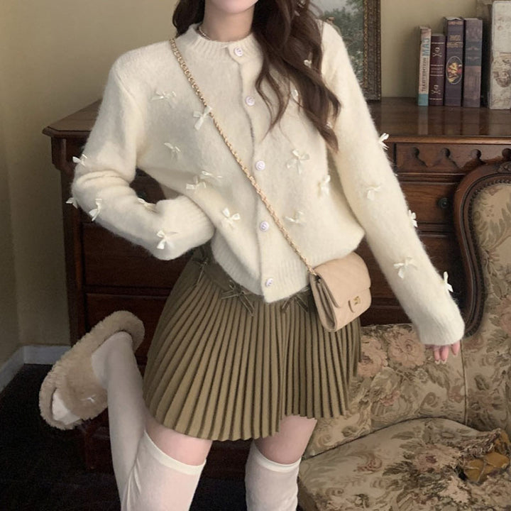 Women's knit jacket with decorative bow appliqués Lune London