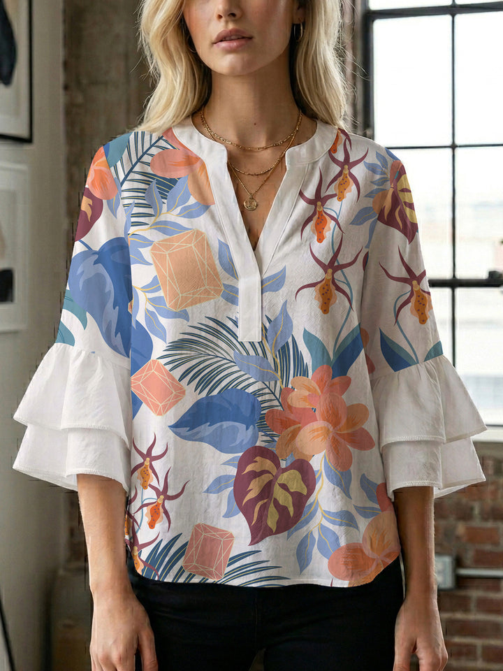Ladies blouse with voluminous ruffled sleeves and floral print Lune London