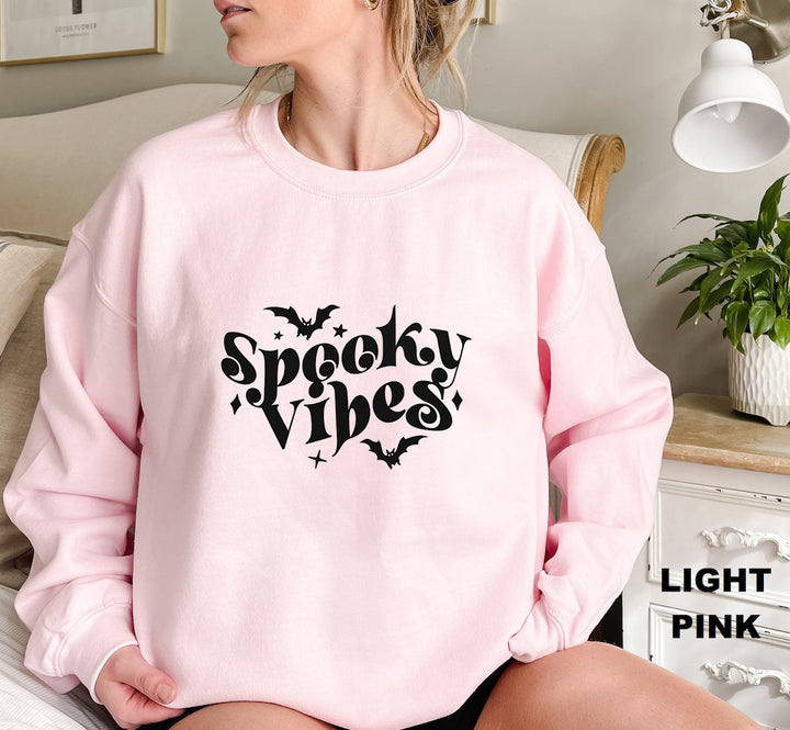 Sweat à capuche pour femmes avec un design Halloween ludique et une coupe confortable Chic & Stil