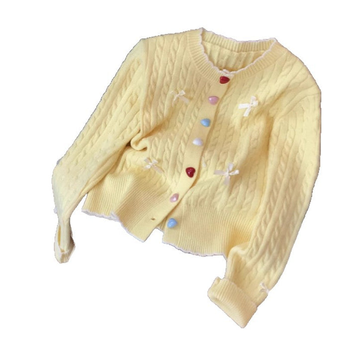 Cardigan en tricot épais pour femmes avec des détails de boutons ludiques et des nœuds