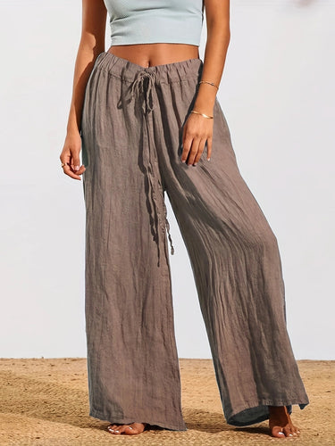 Loose summer pants for women with elastic waistband and practical drawstring Lune London