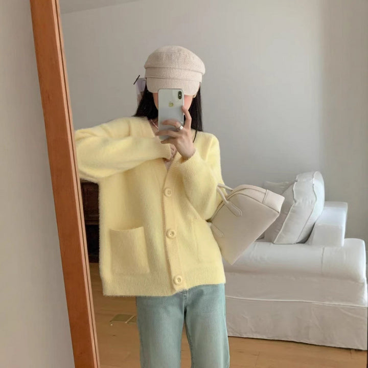 Cardigan pelucheux à boutons pour femmes avec poches élégantes Chic & Stil