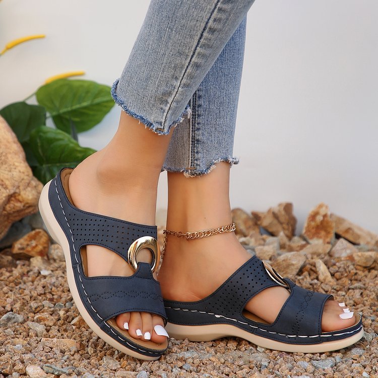Women Sabot with perforations and decorative buckle Lune London