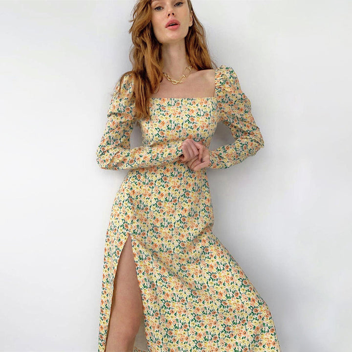 Maxi flower dress for women with asymmetrical slit and puff sleeves Lune London
