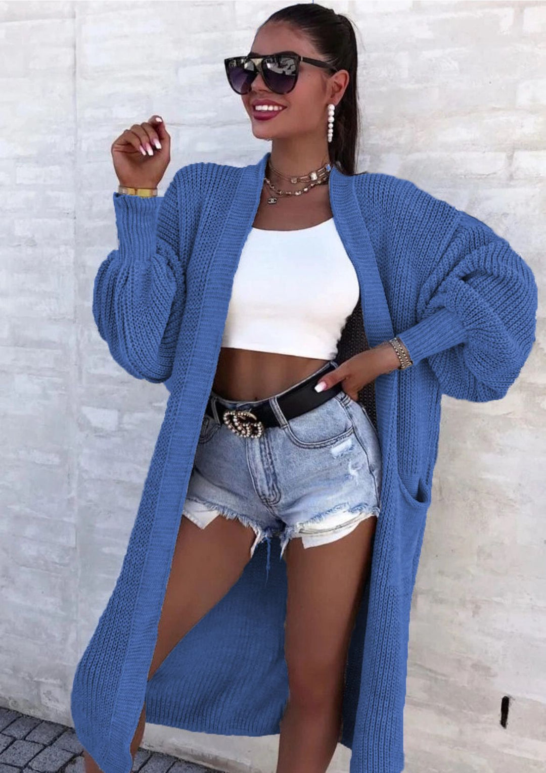 Women Large knit cardigan with deep pockets and generous sleeves Lune London