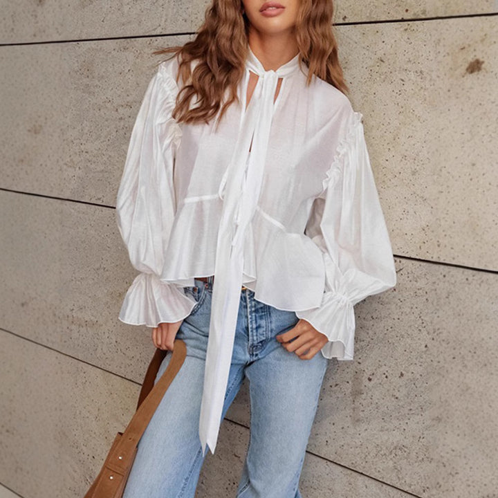Fluid blouse for women with ruffles and a bow detail Chic und Stil