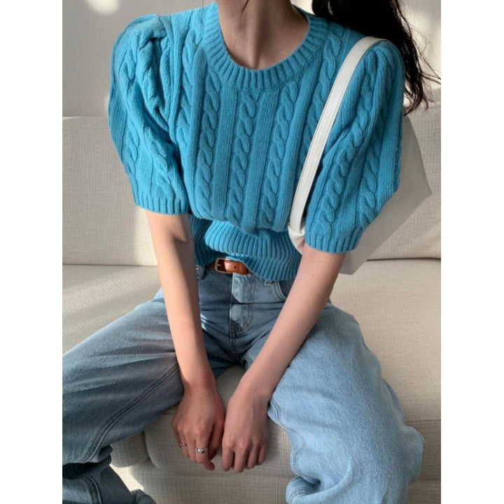 Knitted sweater for women with voluminous sleeves and cable knit pattern Lune London