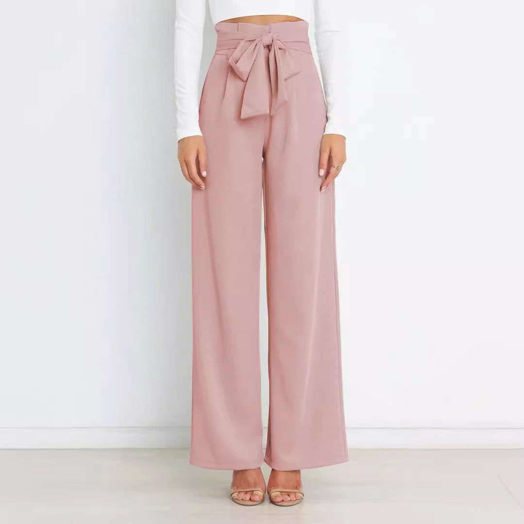 Wide fabric trousers for women with a tie belt and stylish pockets Lune London