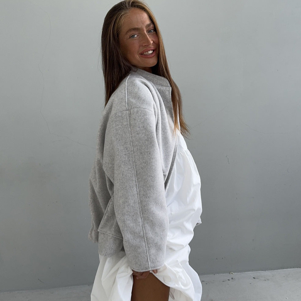 Oversized wool coat for women with simple button details and practical pockets Lune London