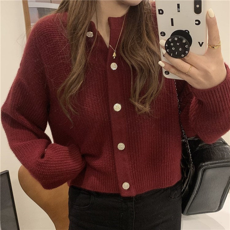 Cardigan pour femmes avec des détails de bouton sophistiqués et une coupe large Chic & Stil