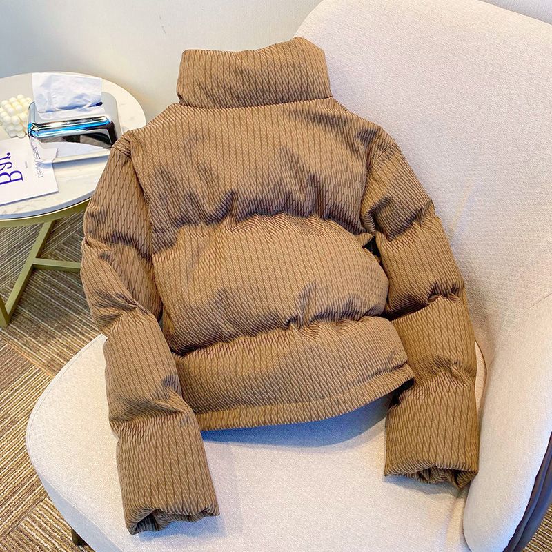 Ladies fashionable down jacket with structured design and practical pockets Lune London