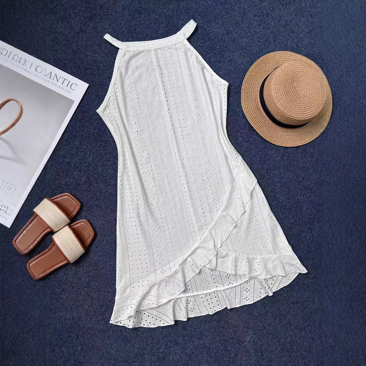 Summer beach dress for women with ruffled hem and breathable hole pattern Lune London