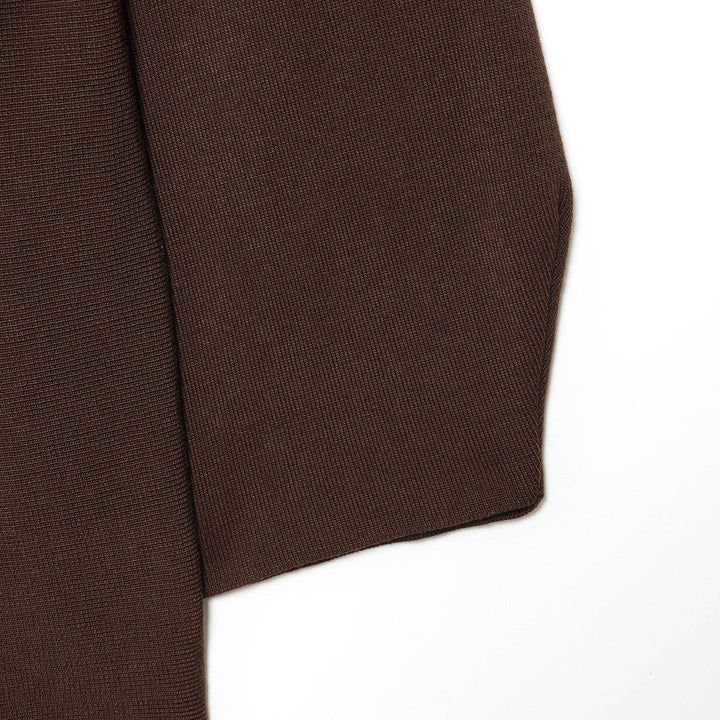 Ladies fitted top with V-neck and tie belt Lune London