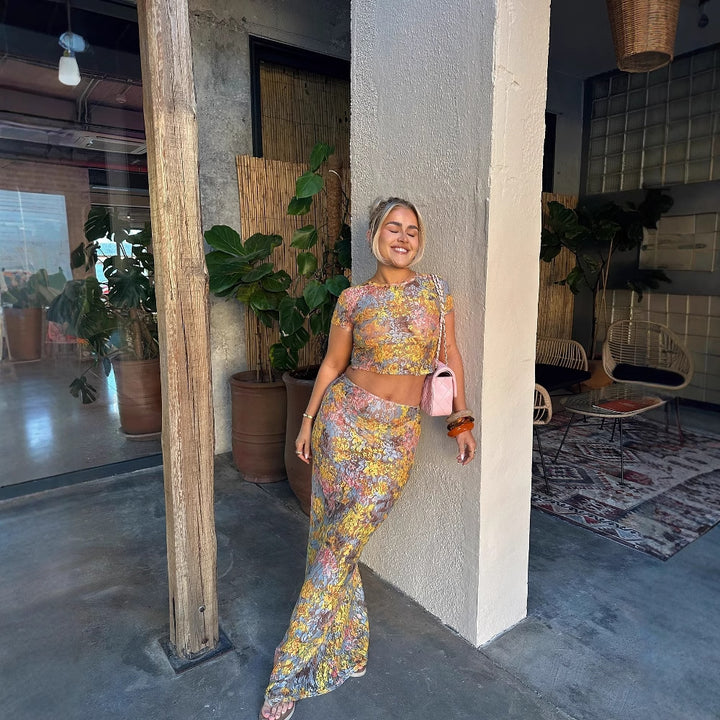 Women’s set consisting of a crop top and a floral patterned maxi skirt Lune London