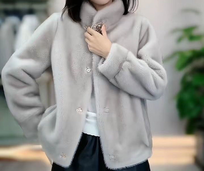 Veste en fleece confortable pour femme avec des détails de boutons élégants Chic & Stil