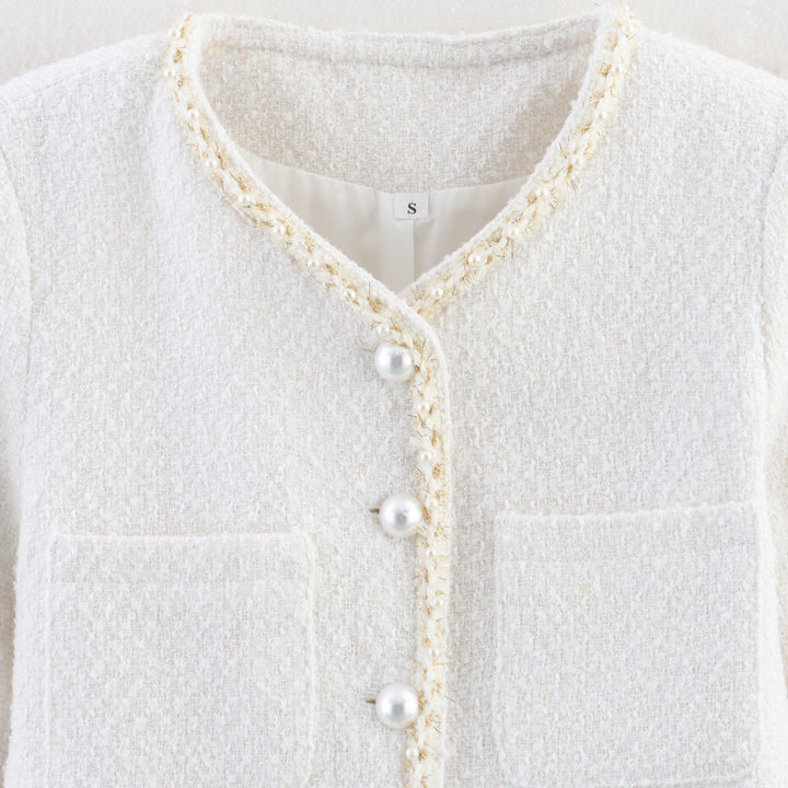 Trendy boucle jacket for ladies with elegant pockets and pearl embellished buttons Lune London