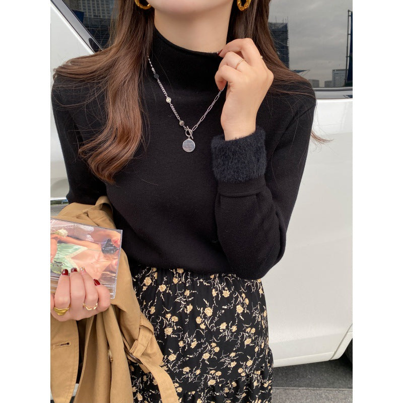 Pull élégant à col roulé pour femmes en matériau doux Chic & Stil