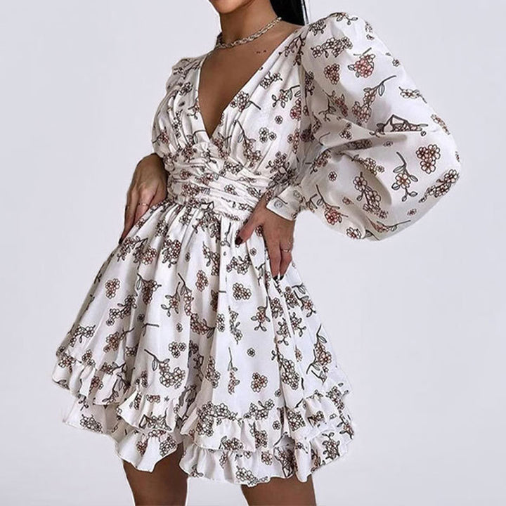 Robe à fleurs ludique pour femmes avec des manches volumineuses et une jupe froncée Chic & Stil