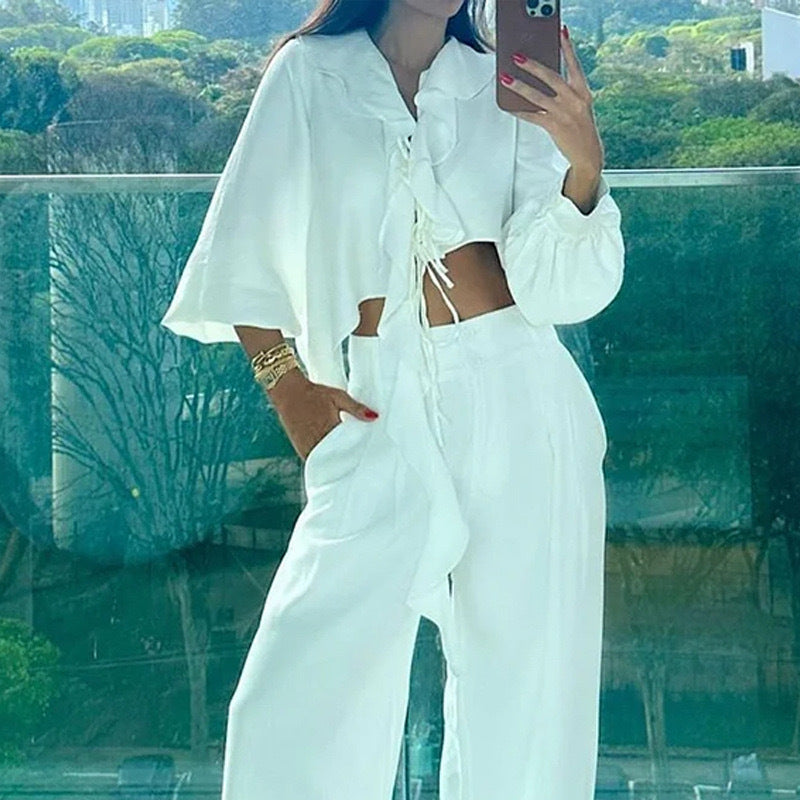 Ladies two-piece set with asymmetric cropped top and wide pants