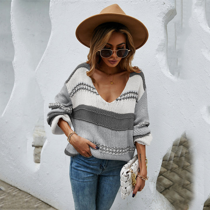 Pull féminin en design tricot décontracté avec col en V et blocs de couleur Chic & Stil