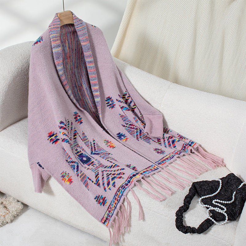 Wool poncho for women with colorful Navajo pattern and fringed hem Lune London