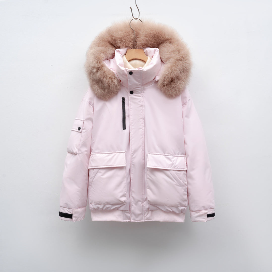 Winter coat for women with bulky faux fur collar and functional pockets Lune London