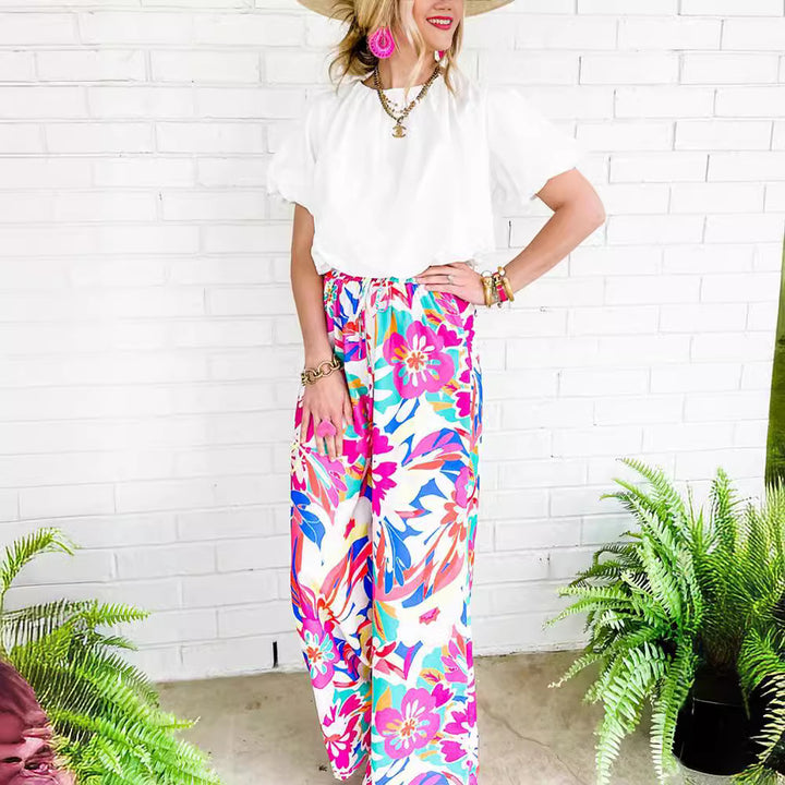 Leisure pants for women, wide, with a colorful floral pattern and an elastic waistband Lune London