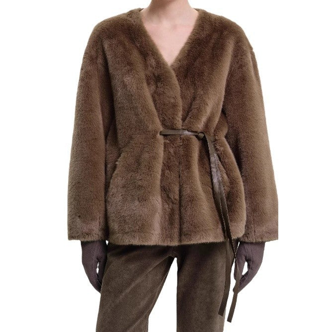 Ladies quilted cozy jacket with adjustable design at the waist and elegant belt Lune London