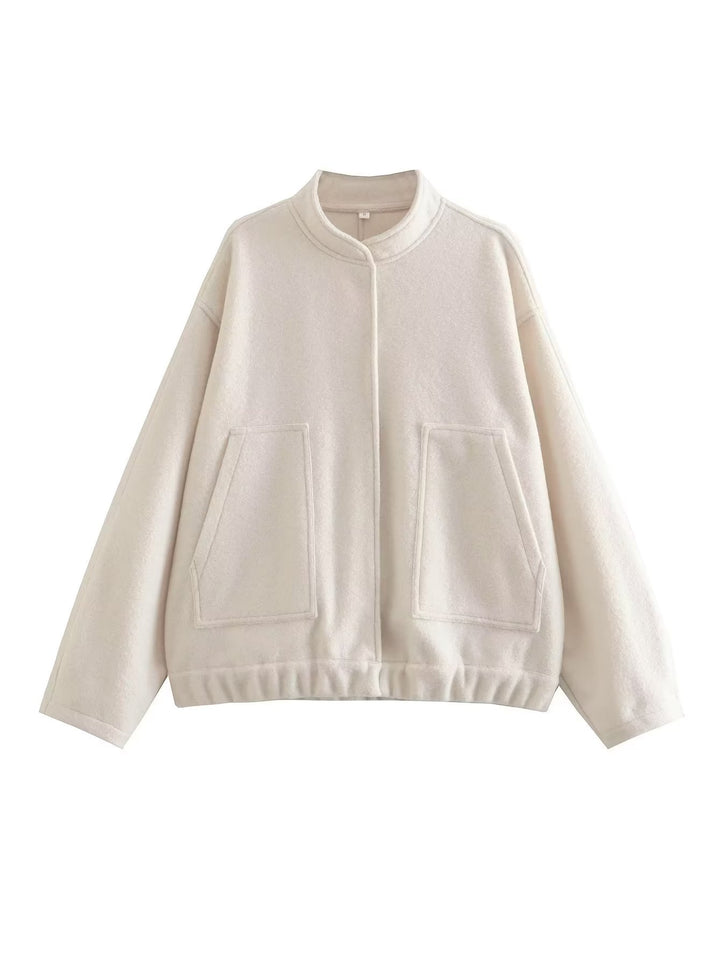 Oversized knit jacket for women in soft teddy fabric with a high collar and side pockets Lune London