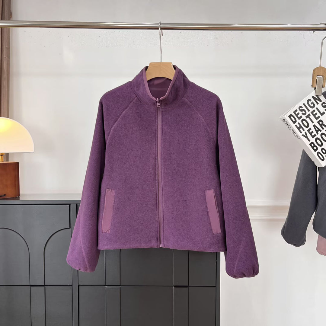 Veste en polaire confortable pour femmes avec col haut et poches pratiques Chic & Stil