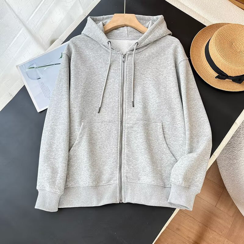 Veste à capuche zippée sportive pour femme avec poches kangourou pratiques Chic & Stil