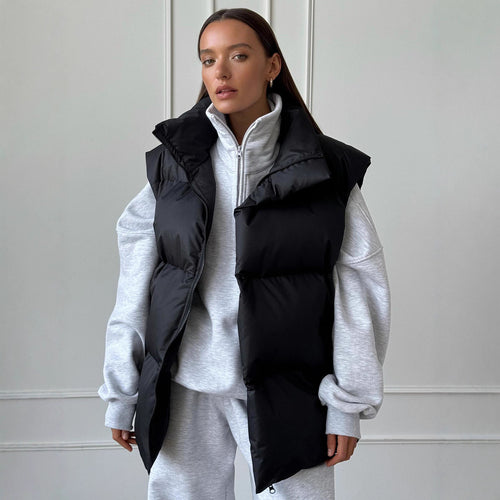 Ladies padded vest with high collar and practical side pockets Lune London