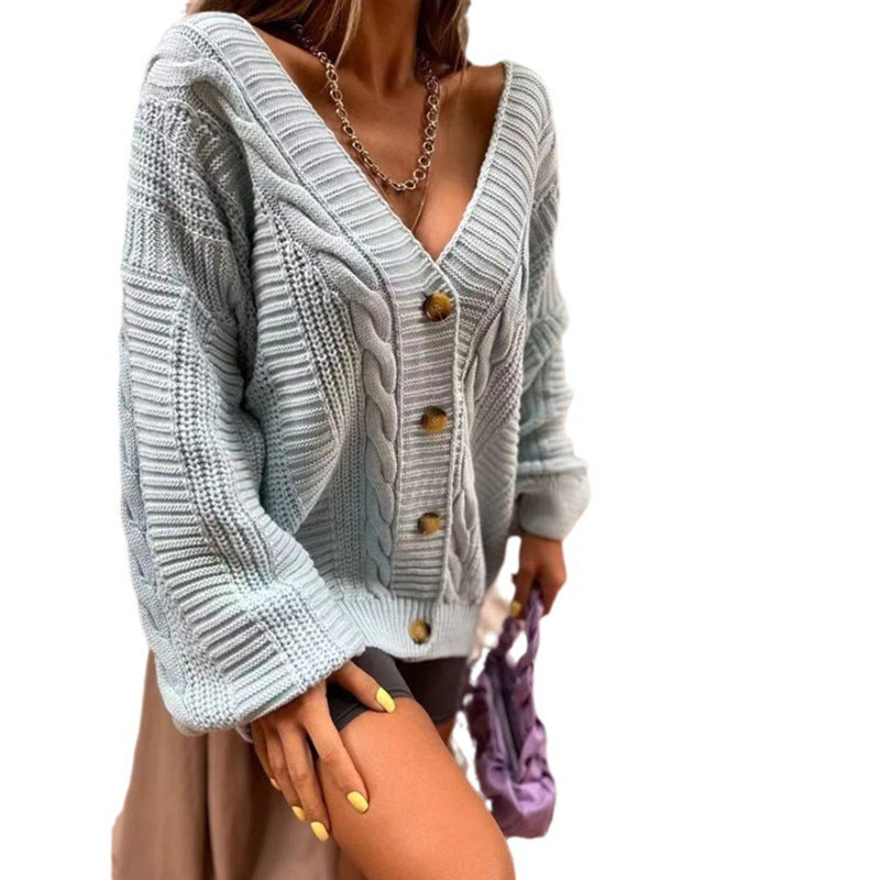 Ladies large knit cardigan with romantic cable design and large buttons Lune London