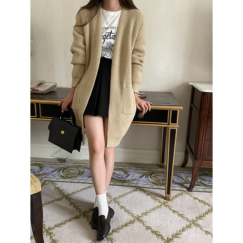 Women's cozy, lightweight knitted cardigan with two pockets Chic & Stil