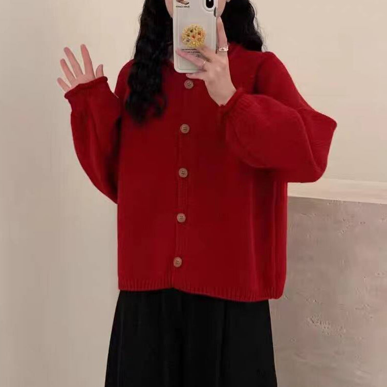 Knitted jacket for women with asymmetrical cut and generous balloon sleeves Lune London