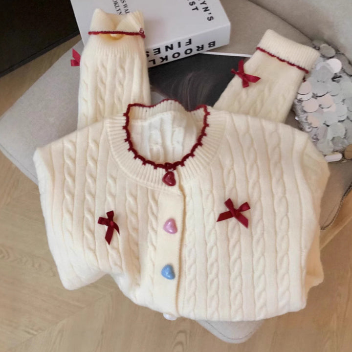 Cardigan en tricot épais pour femmes avec des détails de boutons ludiques et des nœuds