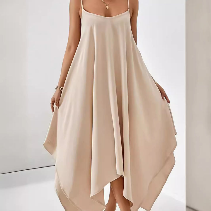 Light women's dress with spaghetti straps, asymmetrical hem, and soft fabric Lune London