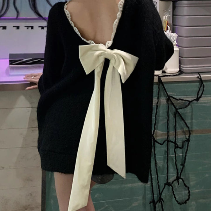 Oversized knit sweater for women with V-neck and delicate lace trim Lune London