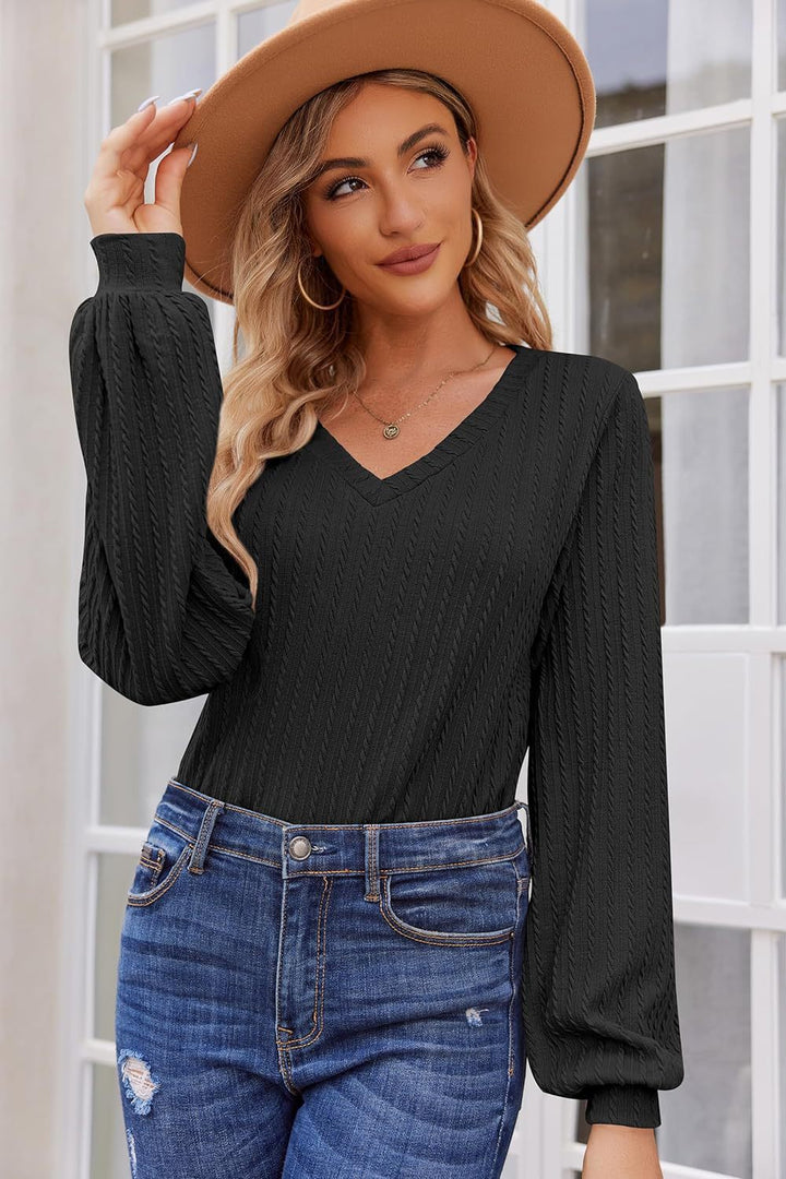 Women's knit sweater with a fine ribbed texture and a casual V-neck Lune London
