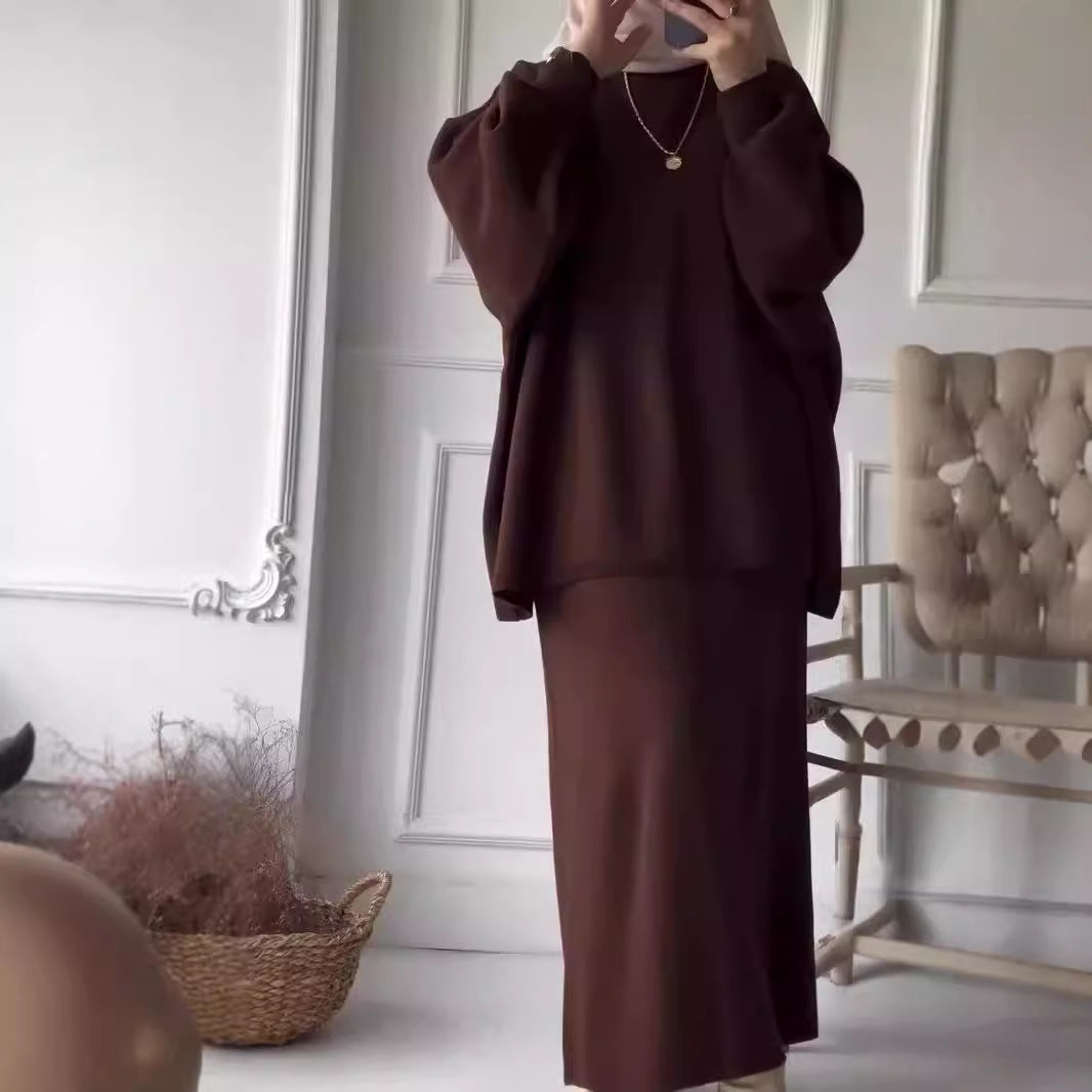 Elegant set for women made up of a casual sweater and a chic midi skirt.