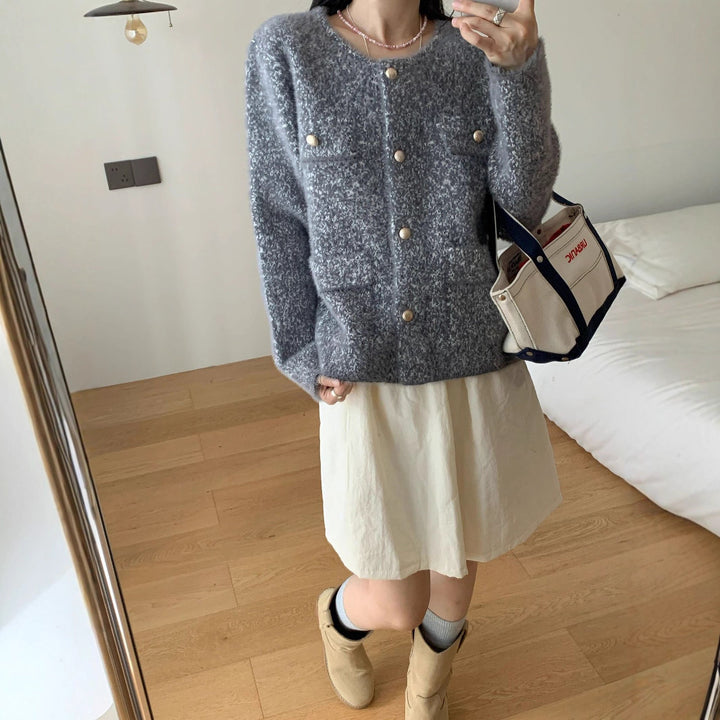Veste en tricot confortable pour femmes avec détails en bouton et poches plaquées Chic & Stil