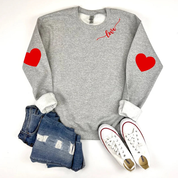 Sweatshirt femme avec design cœur et coupe décontractée Chic & Stil