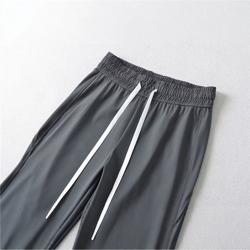 Pantalons évasés sportifs pour femmes avec taille élastique et poches pratiques Chic & Stil