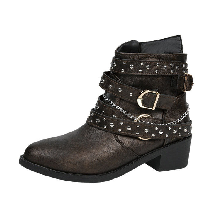 Trendy women's ankle boots with decorative straps and chain elements Lune London