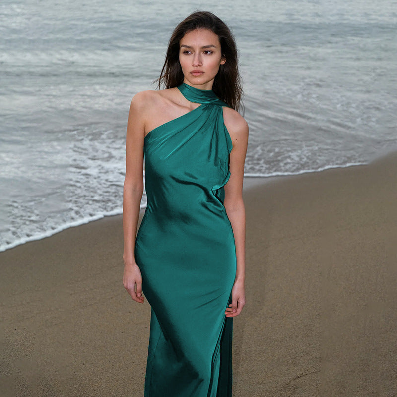 Ladies elegant maxi dress with asymmetric halter design and silky top material