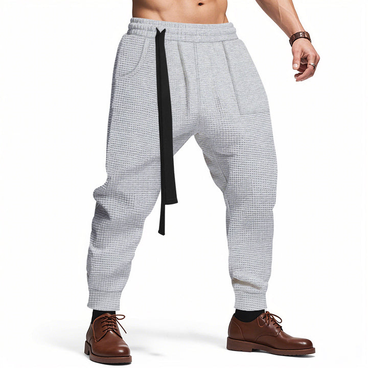 Fashionable men's sweatpants with innovative drawstring and side pockets Lune London