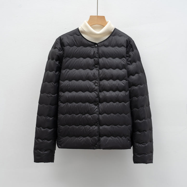 Ladies lightweight quilted jacket with high collar and elastic cuffs Lune London
