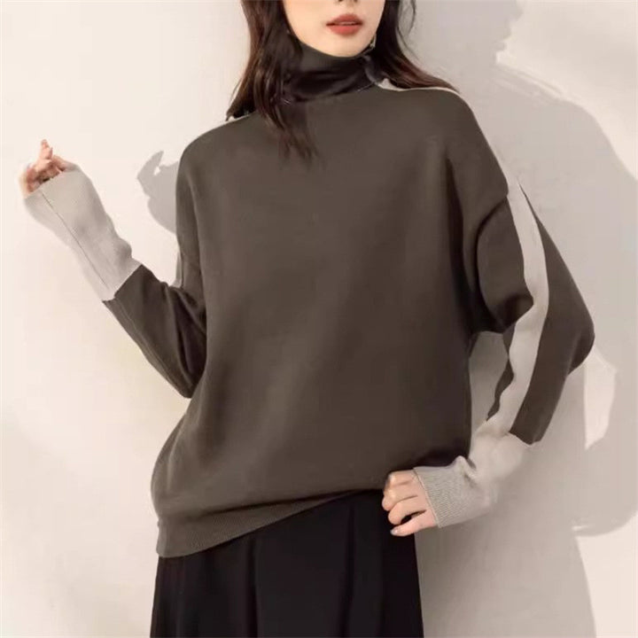 Sweatshirt oversized pour femmes avec col montant moderne et accents de manches contrastants Chic & Stil