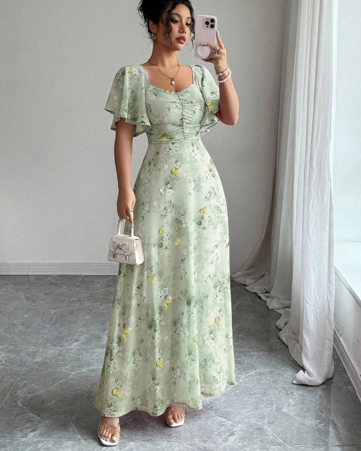 Women's maxi dress with flowing cut and romantic floral pattern Lune London