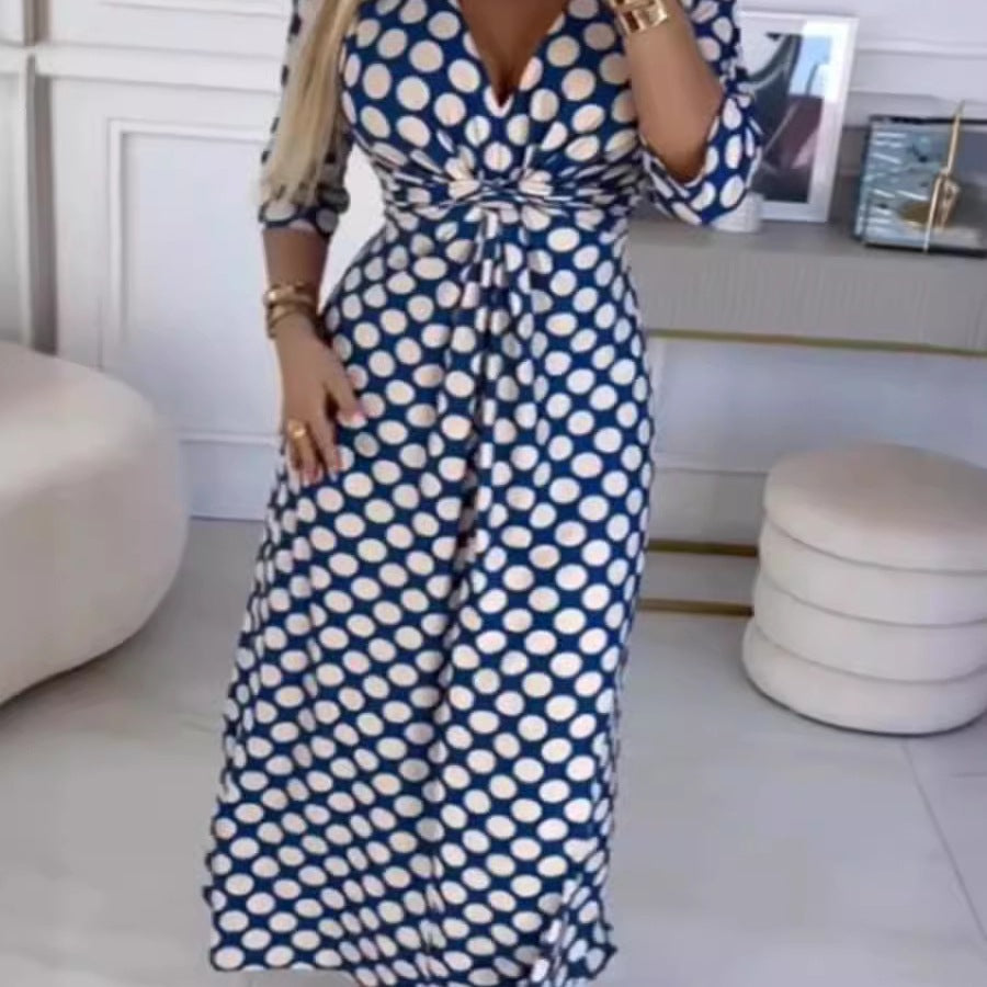 Maxi dress for women with a modern polka dot pattern and an elegant crossover appearance Lune London
